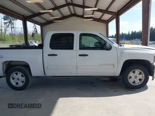 2013 Chevrolet Silverado 1500 LT with VIN 3GCPKSE71DG358722, listed as a IAAI auction lot 42128592 with 206,779 mi miles and . Bid and sale history available at DreamBid. Image 13.