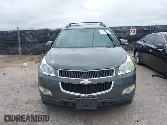 2011 Chevrolet Traverse 1LT z VIN 1GNKRGED0BJ204837, wystawiony jako IAAI lot #42203555 z przebiegiem Nie podano mil oraz . Historia ofert i sprzedaży dostępna na DreamBid. Obrazek 6.