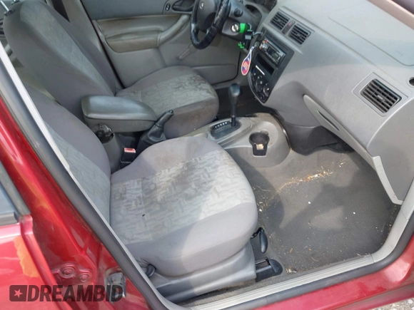 2005 Ford Focus S with VIN 1FAFP34N35W277846, listed as a IAAI auction lot 42423090 with 338,234 mi miles and . Bid and sale history available at DreamBid. Image 5.