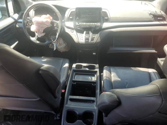 2018 Honda Odyssey EX-L z VIN 5FNRL6H74JB033475, wystawiony jako Copart lot #55736415 z przebiegiem 104 108 mil mil oraz Szkoda całkowita • Salvage title. Historia ofert i sprzedaży dostępna na DreamBid. Obrazek 8.