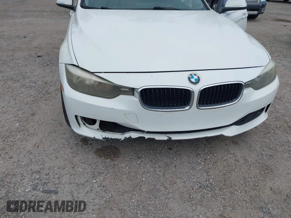 2015 BMW 3 Series 328i with VIN WBA3A5C50FF608327, listed as a IAAI auction lot 42136156 with 213,945 mi miles. Bid and sale history available at carsss.com. Image 6.