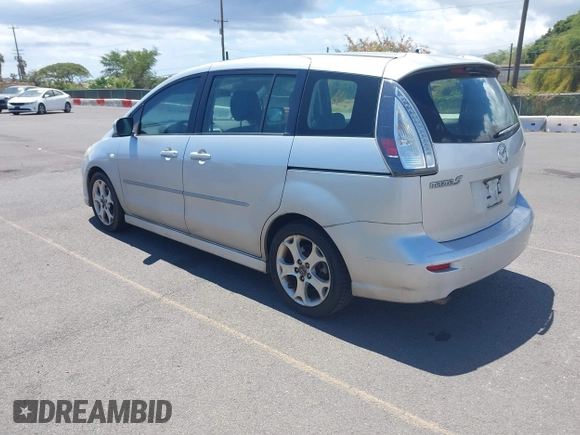 2009 Mazda 5 Sport with VIN JM1CR293990334438, listed as a IAAI auction lot 42561953 with 118,178 mi miles and . Bid and sale history available at DreamBid. Image 3.