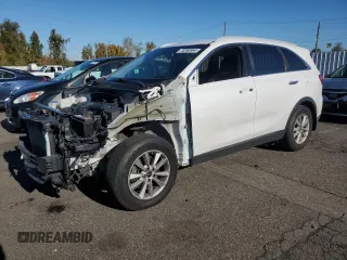 2019 Kia Sorento LX V6 with VIN 5XYPG4A52KG464285, listed as a Copart auction lot 79260864 with 76,837 mi miles and Salvage Title. Bid and sale history available at carsss.com. Image 1.