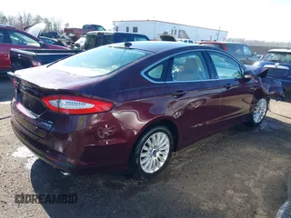 2013 Ford Fusion SE Hybrid with VIN 3FA6P0LU8DR206943, listed as a IAAI auction lot 41822643 with 141,484 mi miles. Bid and sale history available at carsss.com. Image 4.