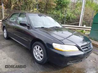 2002 Honda Accord SE z VIN 1HGCG56762A011464, wystawiony jako IAAI lot #41956225 z przebiegiem 209 307 mil mil oraz . Historia ofert i sprzedaży dostępna na DreamBid. Obrazek 1.