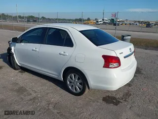 2009 Toyota Yaris with VIN JTDBT903791306893, listed as a IAAI auction lot 41901465 with 115,272 mi miles. Bid and sale history available at carsss.com. Image 3.