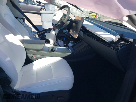 2024 Tesla Model Y Long Range with VIN 7SAYGAEE7RF126351, listed as a IAAI auction lot 41282973 with 5,919 mi miles. Bid and sale history available at carsss.com. Image 5.