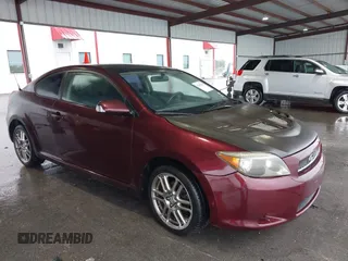 2007 Scion tC Spec with VIN JTKDE177670151732, listed as a IAAI auction lot 42202987 with 112,303 mi miles. Bid and sale history available at carsss.com. Image 1.