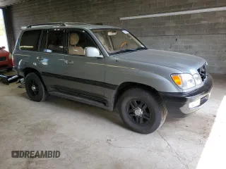 2001 Lexus LX 470 z VIN JTJHT00W113505721, wystawiony jako Copart lot #56463665 z przebiegiem 223 553 mil mil oraz Szkody całkowita. Historia ofert i sprzedaży dostępna na DreamBid. Obrazek 4.