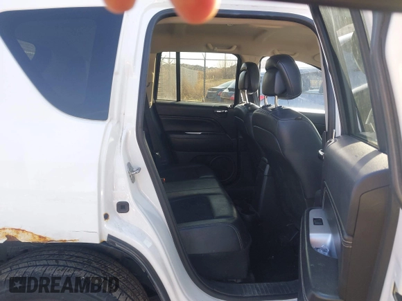 2014 Jeep Compass Latitude with VIN 1C4NJDEB8ED622012, listed as a IAAI auction lot 41917126 with 143,065 mi miles. Bid and sale history available at carsss.com. Image 8.