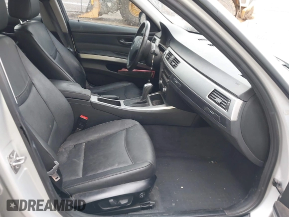 2011 BMW 3 Series 328i with VIN WBAPH7C57BA801980, listed as a IAAI auction lot 42100423 with 130,048 mi miles and . Bid and sale history available at DreamBid. Image 5.