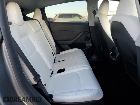 2024 Tesla Model Y Long Range z VIN 7SAYGAEEXRF211507, wystawiony jako Copart lot #56432715 z przebiegiem Nie podano mil oraz Szkoda całkowita • Salvage title. Historia ofert i sprzedaży dostępna na DreamBid. Obrazek 11.