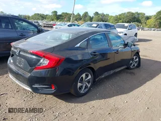 2019 Honda Civic LX with VIN 2HGFC2F65KH549993, listed as a IAAI auction lot 40394538 with 92,951 mi miles and . Bid and sale history available at DreamBid. Image 4.