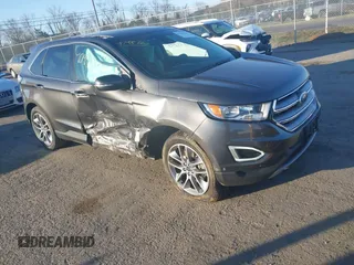 2015 Ford Edge Titanium with VIN 2FMPK4K87FBB77277, listed as a IAAI auction lot 41795760 with 164,844 mi miles. Bid and sale history available at carsss.com. Image 1.