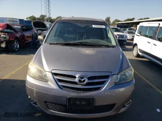 2004 Mazda MPV LX with VIN JM3LW28AX40506050, listed as a Copart auction lot 74335234 with 211,708 mi miles and Salvage Title. Bid and sale history available at carsss.com. Image 5.