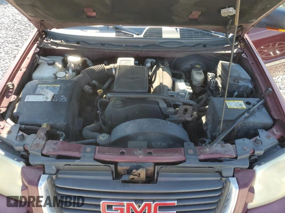 2002 GMC Envoy SLT with VIN 1GKDS13S322490024, listed as a Copart auction lot 53459495 with 144,747 mi miles and Clean Title. Bid and sale history available at carsss.com. Image 12.