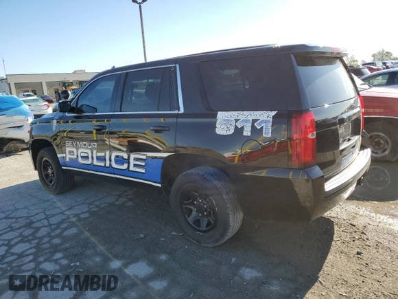 2015 Chevrolet Tahoe Commercial with VIN 1GNLC2ECXFR591789, listed as a Copart auction lot 54121265 with 111,326 mi miles and Salvage title. Bid and sale history available at DreamBid. Image 2.