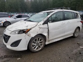 2014 Mazda 5 Grand Touring with VIN JM1CW2DL7E0171184, listed as a Copart auction lot 87304144 with 192,946 mi miles and Salvage Title. Bid and sale history available at DreamBid. Image 1.