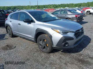 2024 Subaru Crosstrek with VIN JF2GUABC0R8213658, listed as a IAAI auction lot 42222762 with 19,872 mi miles and . Bid and sale history available at DreamBid. Image 1.