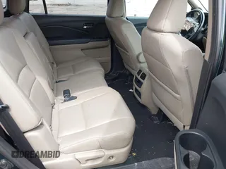 2017 Honda Pilot EX-L with VIN 5FNYF6H50HB033968, listed as a IAAI auction lot 42400720 with 119,597 mi miles and . Bid and sale history available at DreamBid. Image 8.