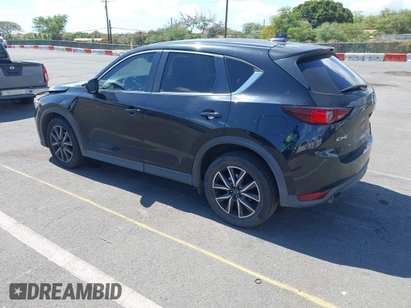 2018 Mazda CX-5 Touring z VIN JM3KFACM5J0309533, wystawiony jako IAAI lot #42195429 z przebiegiem 91 928 mil mil oraz . Historia ofert i sprzedaży dostępna na DreamBid. Obrazek 3.