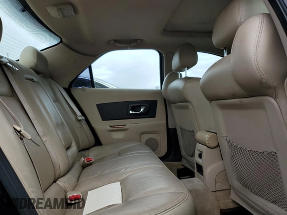 2004 Cadillac CTS with VIN 1G6DM577340110541, listed as a Copart auction lot 79263544 with 156,822 mi miles and Salvage Title. Bid and sale history available at carsss.com. Image 10.