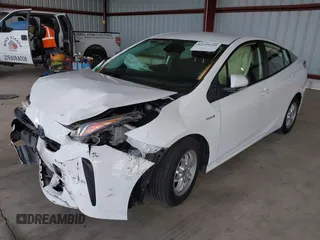 2021 Toyota Prius L Eco z VIN JTDKAMFU5M3146342, wystawiony jako IAAI lot #42249219 z przebiegiem 49 810 mil mil oraz . Historia ofert i sprzedaży dostępna na DreamBid. Obrazek 2.
