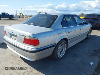 2001 BMW 7 Series 740iA with VIN WBAGG83451DN86662, listed as a IAAI auction lot 41967255 with 187,669 mi miles. Bid and sale history available at carsss.com. Image 4.