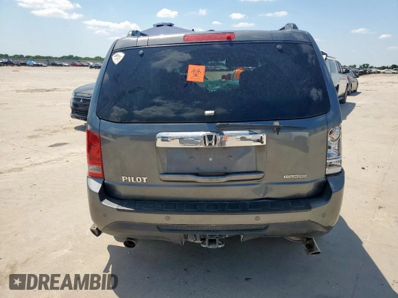 2013 Honda Pilot Touring z VIN 5FNYF3H97DB032389, wystawiony jako Copart lot #58387645 z przebiegiem Nie podano mil oraz Szkoda całkowita • Salvage title. Historia ofert i sprzedaży dostępna na DreamBid. Obrazek 6.
