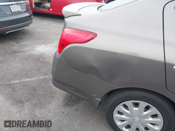 2015 Nissan Versa S Plus with VIN 3N1CN7AP9FL810597, listed as a IAAI auction lot 41681629 with 133,777 mi miles. Bid and sale history available at carsss.com. Image 6.