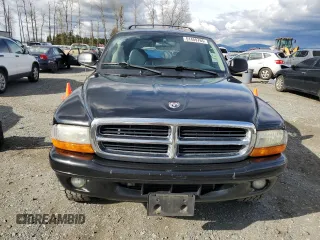 2002 Dodge Durango SLT z VIN 1B4HS48N02F179268, wystawiony jako Copart lot #51459765 z przebiegiem 210 934 mil mil oraz Czysty tytuł • Clean title. Historia ofert i sprzedaży dostępna na DreamBid. Obrazek 5.