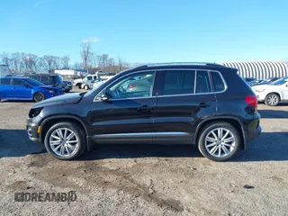2014 Volkswagen Tiguan S z VIN WVGBV3AX4EW581302, wystawiony jako IAAI lot #41033175 z przebiegiem 69 791 mil mil oraz . Historia ofert i sprzedaży dostępna na DreamBid. Obrazek 14.