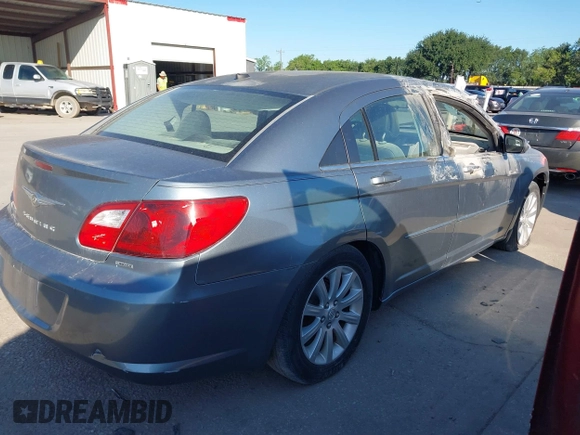 2010 Chrysler Sebring Limited with VIN 1C3CC5FD6AN190813, listed as a IAAI auction lot 42228345 with 113,512 mi miles and . Bid and sale history available at DreamBid. Image 4.