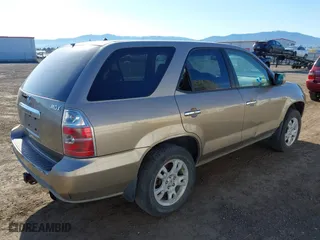 2004 Acura MDX Touring Pkg w/Navigation with VIN 2HNYD18894H504341, listed as a IAAI auction lot 42062972 with 260,894 mi miles. Bid and sale history available at carsss.com. Image 4.