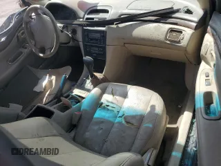 2000 Toyota Solara SE z VIN 2T1CF28P0YC350027, wystawiony jako Copart lot #52181555 z przebiegiem 220 178 mil mil oraz Szkoda całkowita • Salvage title. Historia ofert i sprzedaży dostępna na DreamBid. Obrazek 8.