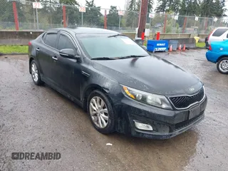 2015 Kia Optima EX with VIN 5XXGN4A71FG391444, listed as a IAAI auction lot 41991844 with 126,197 mi miles. Bid and sale history available at carsss.com. Image 1.