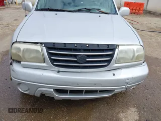 2002 Suzuki XL7 Standard z VIN JS3TY92V824101190, wystawiony jako IAAI lot #41749203 z przebiegiem 239 447 mil mil oraz . Historia ofert i sprzedaży dostępna na DreamBid. Obrazek 6.