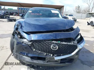 2021 Mazda CX-30 Select with VIN 3MVDMABL5MM272418, listed as a IAAI auction lot 41783355 with 25,429 mi miles and . Bid and sale history available at DreamBid. Image 13.