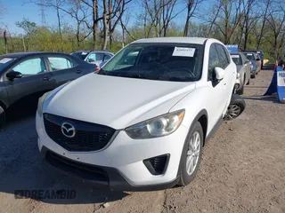 2014 Mazda CX-5 Sport with VIN JM3KE2BE8E0301175, listed as a IAAI auction lot 42051972 with 121,821 mi miles and . Bid and sale history available at carsss.com. Image 17.