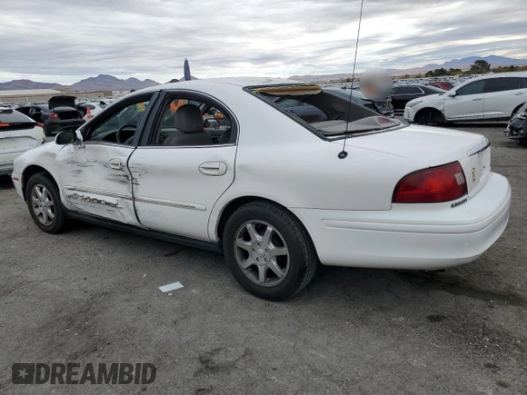 2001 Mercury Sable with VIN 1MEFM53U31A629921, listed as a Copart auction lot 77173754 with 122,769 mi miles and Salvage title. Bid and sale history available at DreamBid. Image 2.
