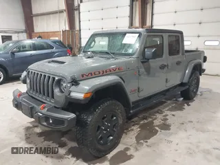 2021 Jeep Gladiator Mojave z VIN 1C6JJTEG5ML524829, wystawiony jako IAAI lot #42247982 z przebiegiem 20 158 mil mil oraz . Historia ofert i sprzedaży dostępna na DreamBid. Obrazek 2.