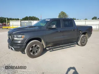 2020 Ram 1500 Rebel with VIN 1C6SRFLT4LN144723, listed as a Copart auction lot 59843935 with 90,936 mi miles and Salvage title. Bid and sale history available at DreamBid. Image 1.