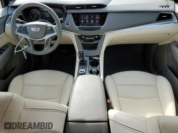 2022 Cadillac XT5 AWD Premium Luxury with VIN 1GYKNDRSXNZ121976, listed as a Copart auction lot 47200175 with 21,627 mi miles and Clean title. Bid and sale history available at DreamBid. Image 8.