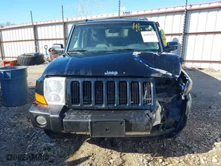 2006 Jeep Commander with VIN 1J8HG48N66C174256, listed as a IAAI auction lot 41652107 with 106,966 mi miles. Bid and sale history available at carsss.com. Image 13.
