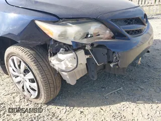 2012 Toyota Corolla L with VIN 2T1BU4EE9CC844184, listed as a IAAI auction lot 42102550 with 151,622 mi miles. Bid and sale history available at carsss.com. Image 6.