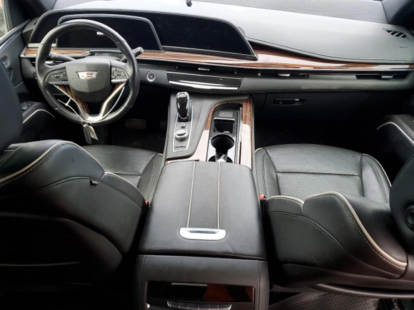 2021 Cadillac Escalade Premium Luxury with VIN 1GYS4BKL9MR215159, listed as a Copart auction lot 48577415 with 50,773 mi miles and Salvage Title. Bid and sale history available at carsss.com. Image 8.