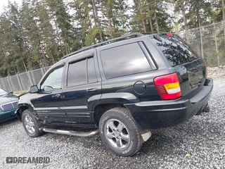 2004 Jeep Grand Cherokee Limited with VIN 1J8GW58N04C186548, listed as a IAAI auction lot 41949015 with 244,505 mi miles. Bid and sale history available at carsss.com. Image 15.