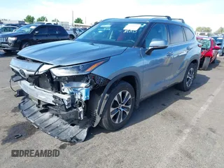 2021 Toyota Highlander XLE with VIN 5TDHZRBH2MS124631, listed as a IAAI auction lot 42660410 with 84,306 mi miles and . Bid and sale history available at DreamBid. Image 18.