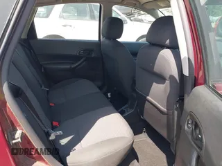 2007 Ford Focus S z VIN 1FAFP37N27W177462, wystawiony jako IAAI lot #42465629 z przebiegiem 169 895 mil mil oraz . Historia ofert i sprzedaży dostępna na DreamBid. Obrazek 8.