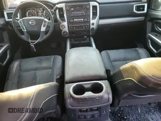 2019 Nissan Titan Pro-4X z VIN 1N6AA1E53KN525603, wystawiony jako Copart lot #77336264 z przebiegiem 64 507 mil mil oraz Szkoda całkowita • Salvage title. Historia ofert i sprzedaży dostępna na DreamBid. Obrazek 8.
